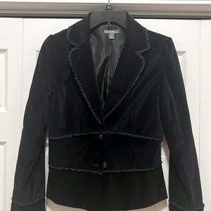 Black velveteen jacket in size 4